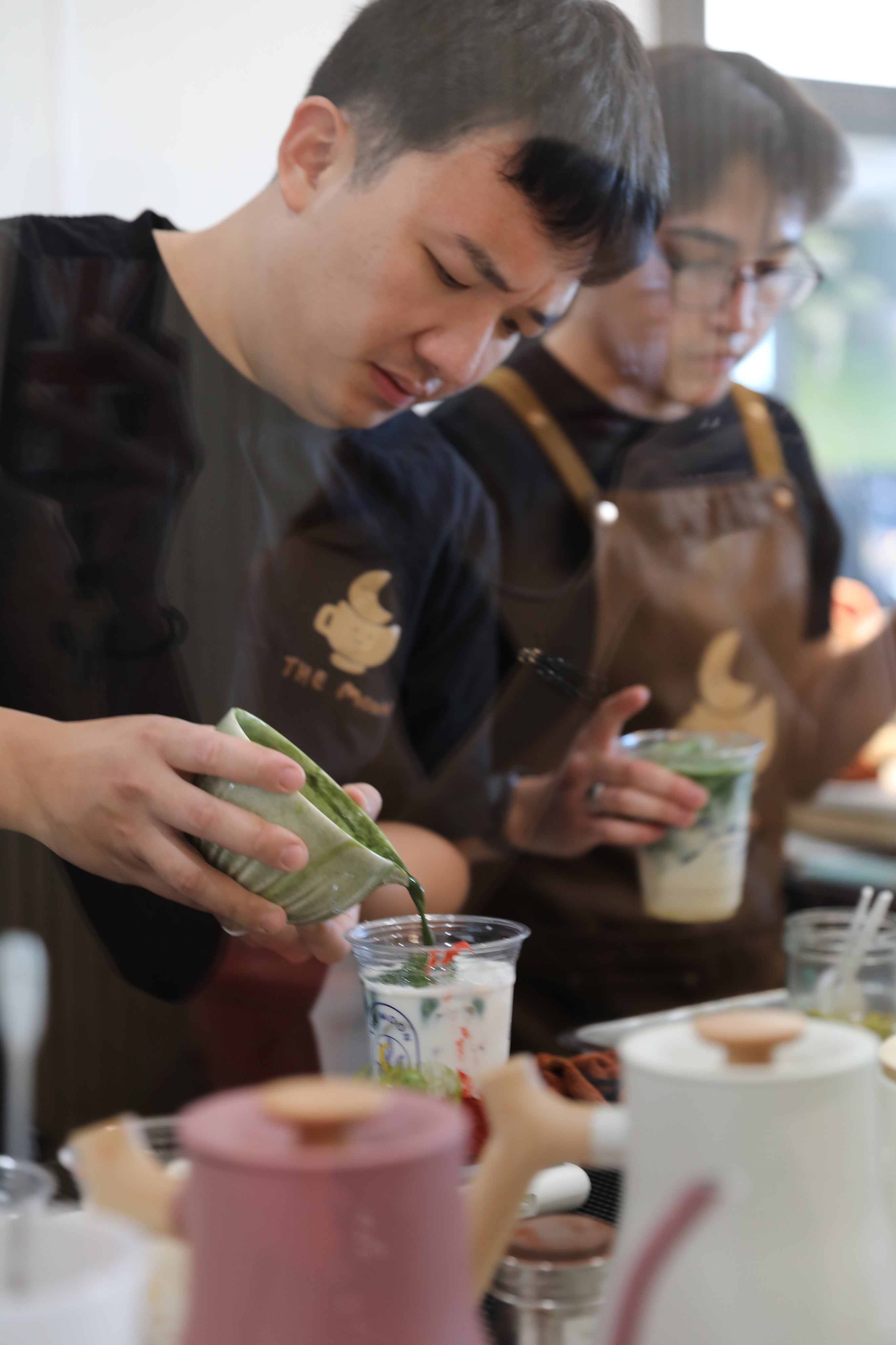 The Moon team making matcha drinks together